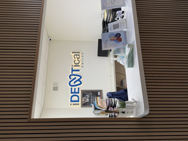 iDENtical Smiles — Reception Logo