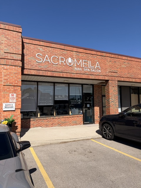 Sacromela — Building Sign