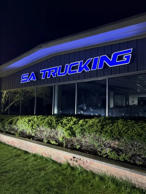 SA Trucking — Illuminated Letters