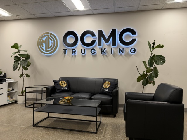 OCMC Trucking — Lobby Logo